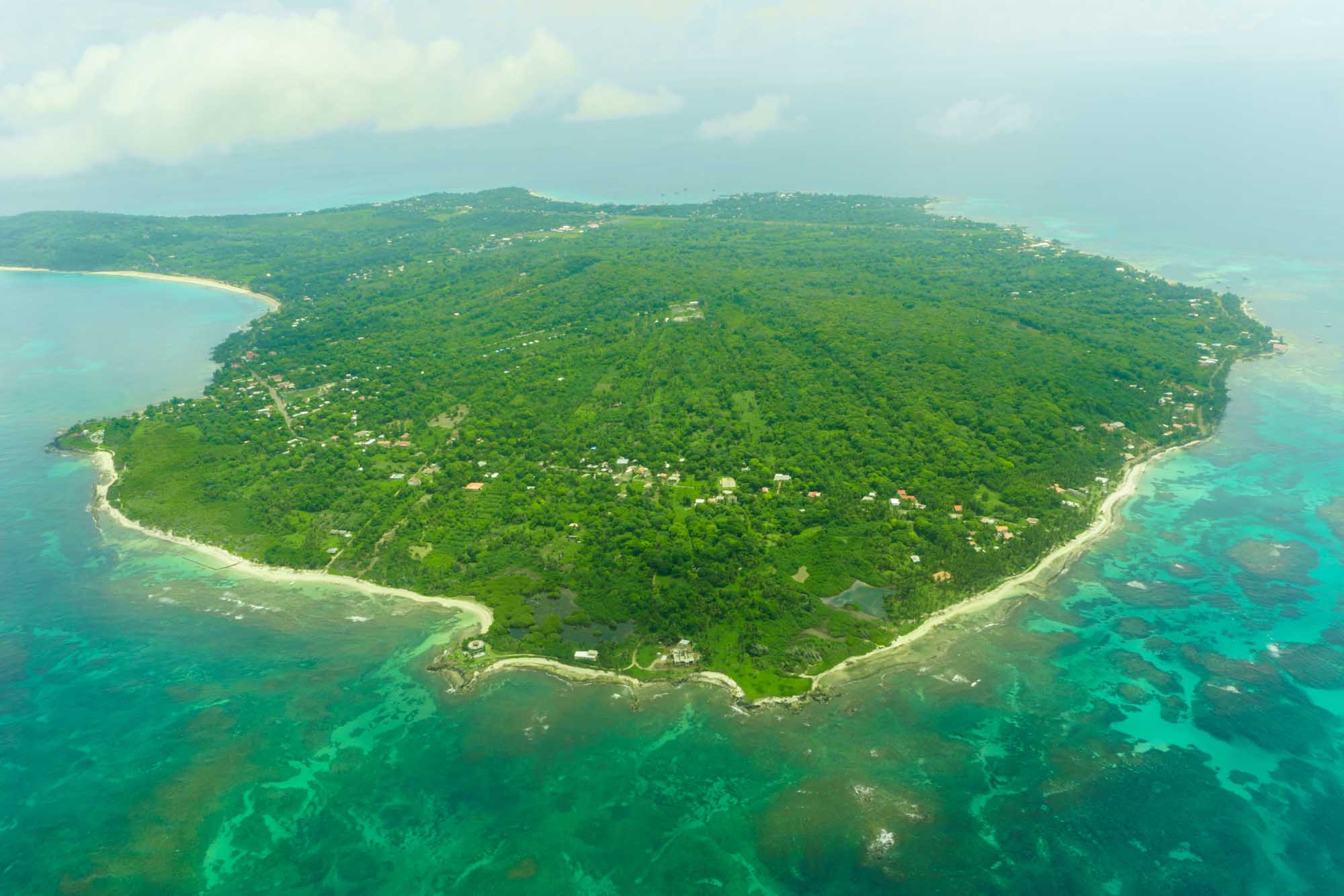 Aerial View of Big Corn Island, Nicaragua An aerial photograph of Big Corn Island, Nicaragua, showing a lush, densely forested tropical
