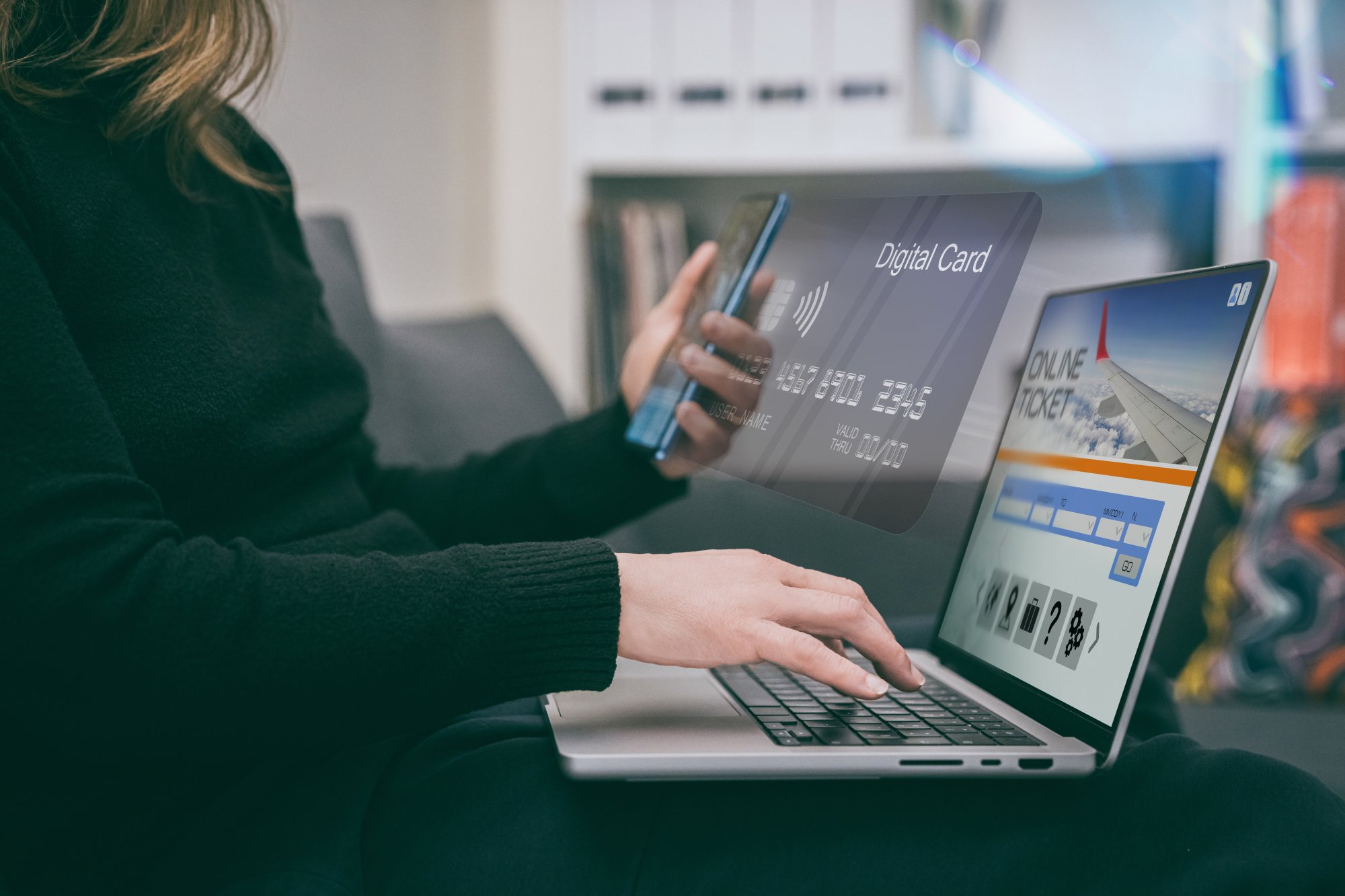 Online Travel Booking with Digital Payment A person using a laptop to book travel online, holding a digital card for payment while viewing