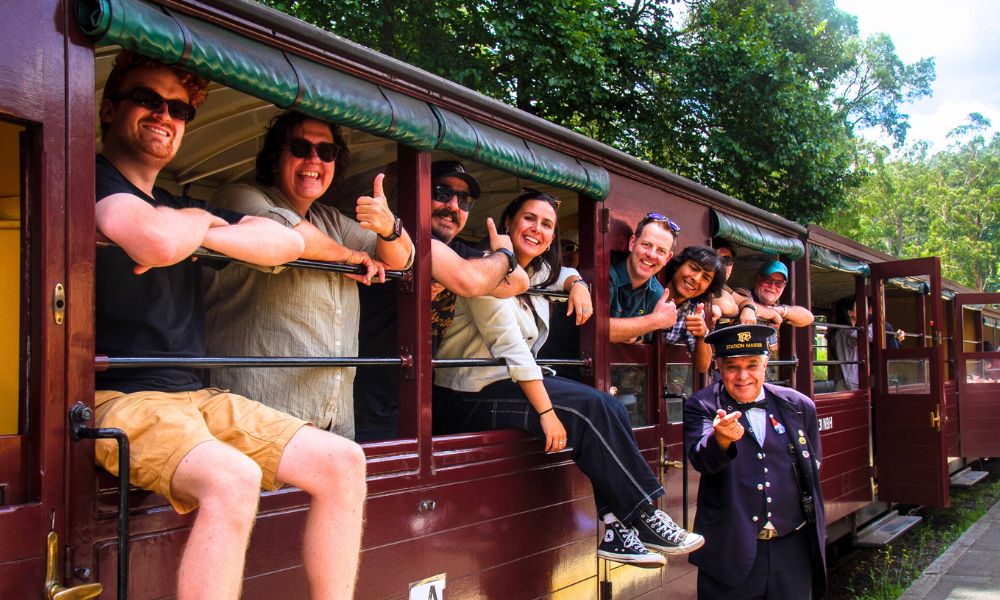 Guests Enjoying Vintage Train Experience Guests at PUFF