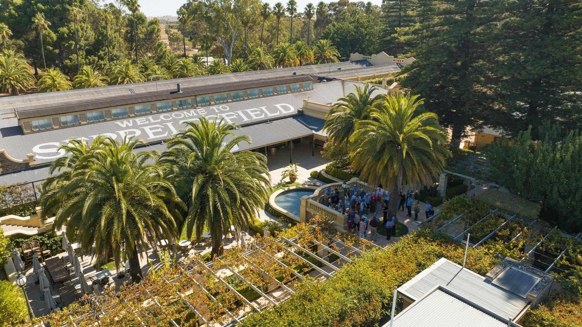 Indian Pacific Seppeltsfield Signature Dinner Venue – Barossa Valley An aerial view of the Seppeltsfield winery estate in Australia's Barossa Valley, showing a modern